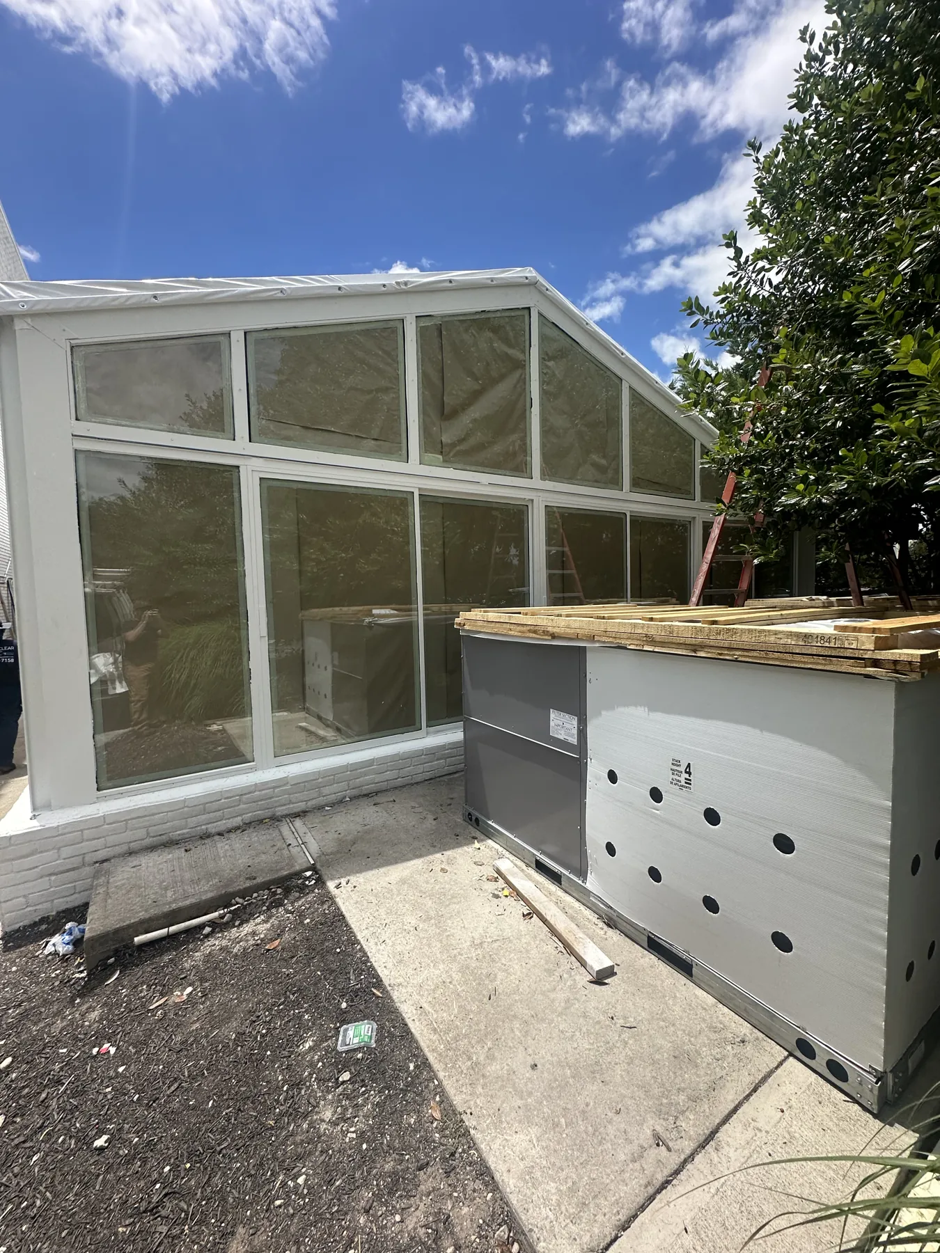 Commercial rooftop HVAC unit with new spiral ductwork