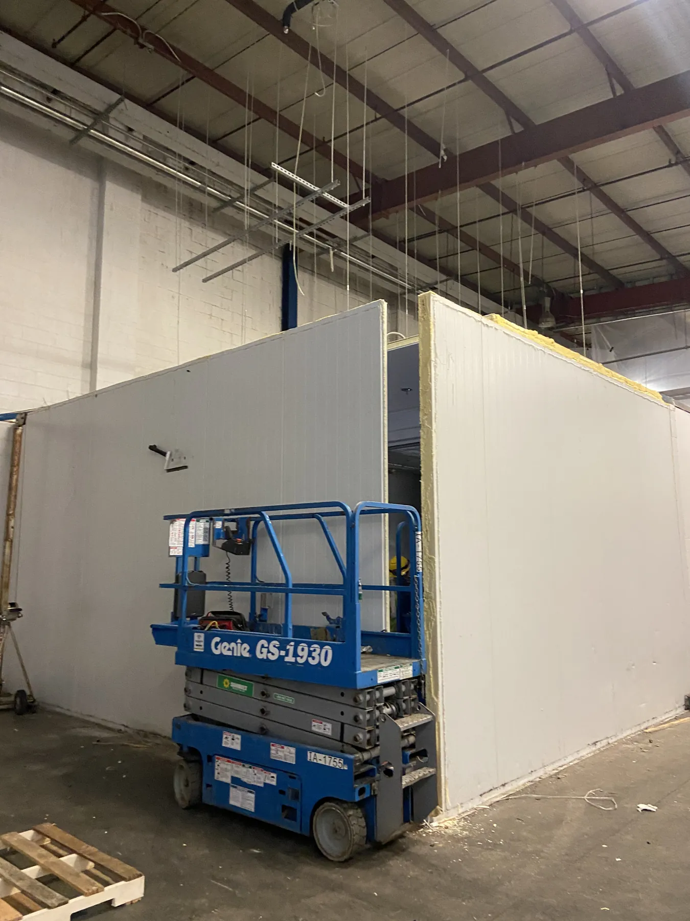 Large insulated cold-room panel build in an industrial warehouse